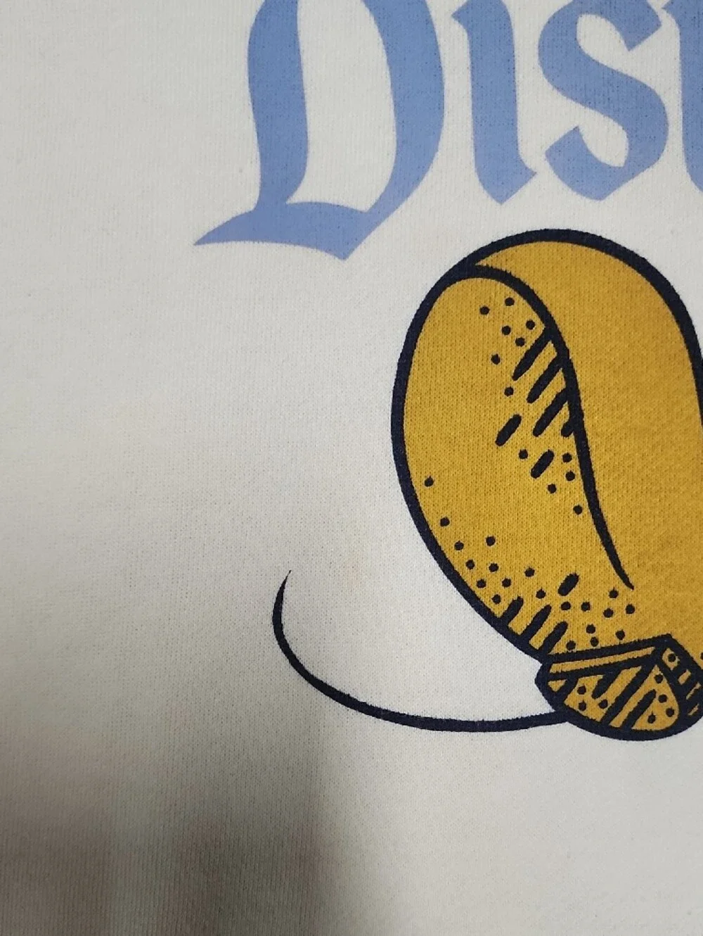 Disney cream crewneck